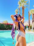 Pattie Cosplay poses by the pool