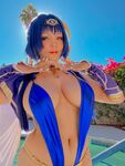 Pattie Cosplay poses by the pool