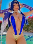 Pattie Cosplay poses by the pool