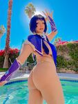 Pattie Cosplay poses by the pool