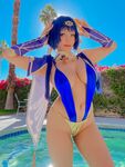 Pattie Cosplay poses by the pool
