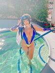 Pattie Cosplay poses by the pool