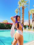 Pattie Cosplay poses by the pool