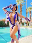 Pattie Cosplay poses by the pool