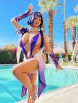Pattie Cosplay poses by the pool