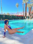 Pattie Cosplay poses by the pool