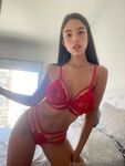 OnlyFans performer Jenny Santorini posing in her trending lingerie in a solo