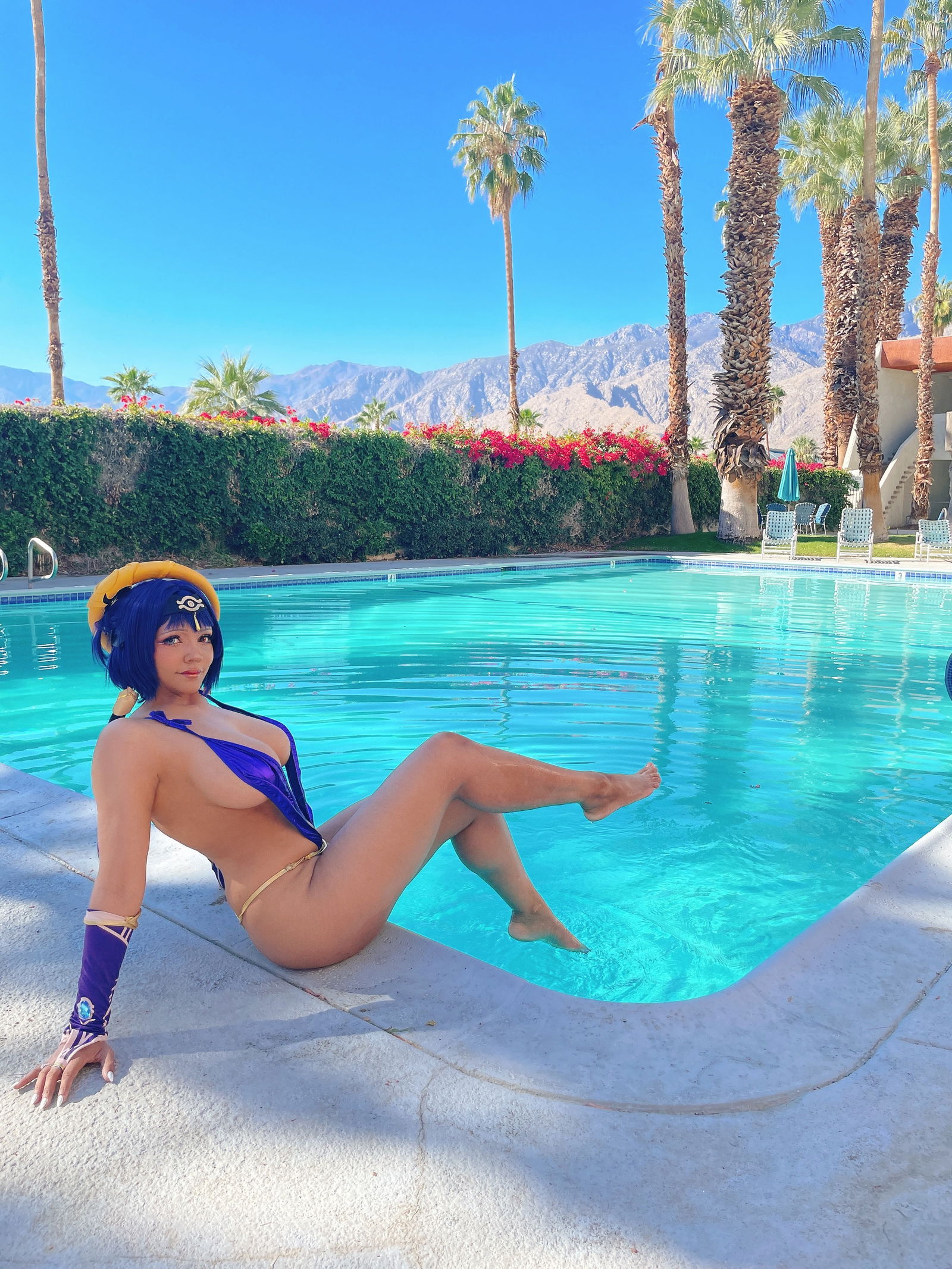 Pattie Cosplay poses by the pool